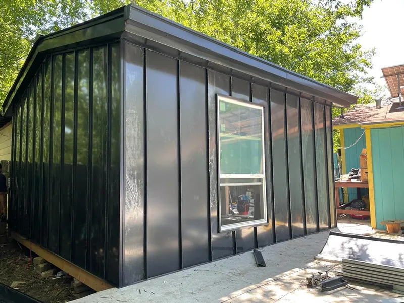 Black standing seam metal wall panels for Metal Roof Installation in West Pensacola